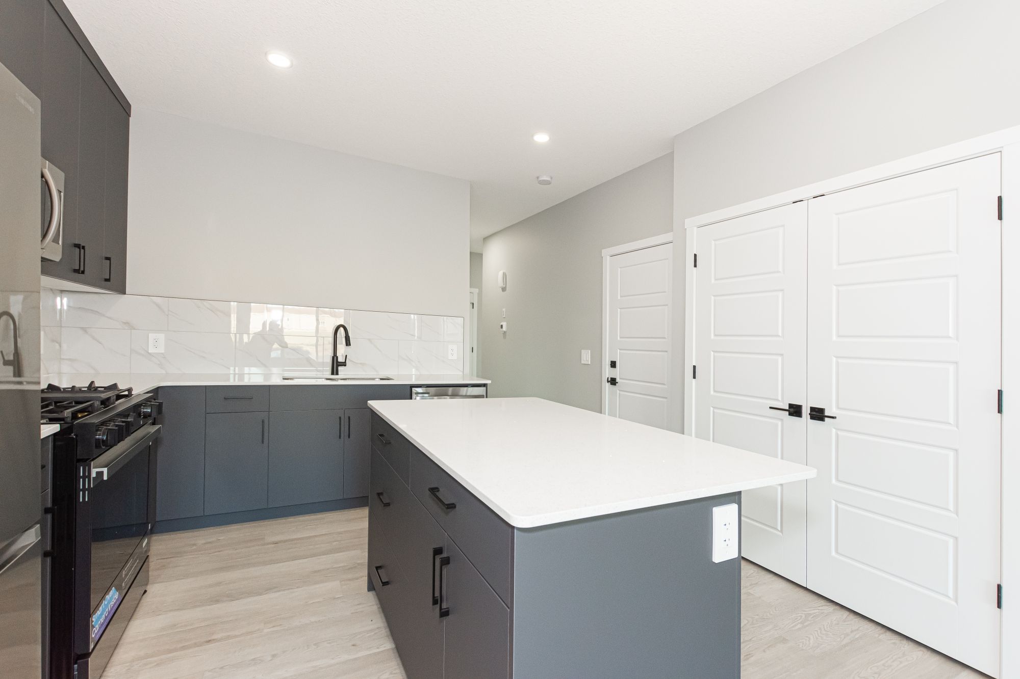 Brand New 4-Bedroom Home with Oversized Double Garage & Bonus Den in Edgemont