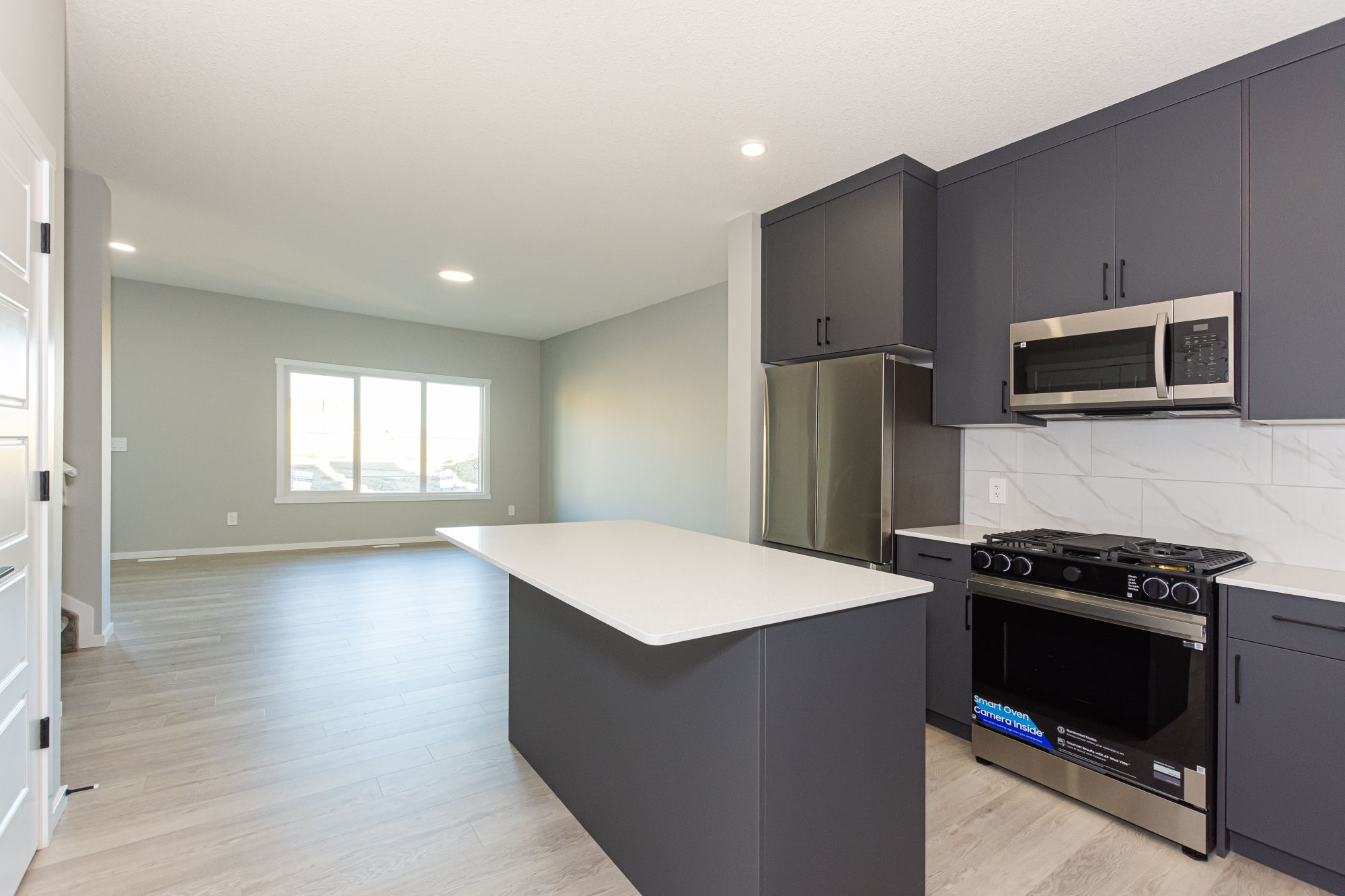 Brand New 4-Bedroom Home with Oversized Double Garage & Bonus Den in Edgemont